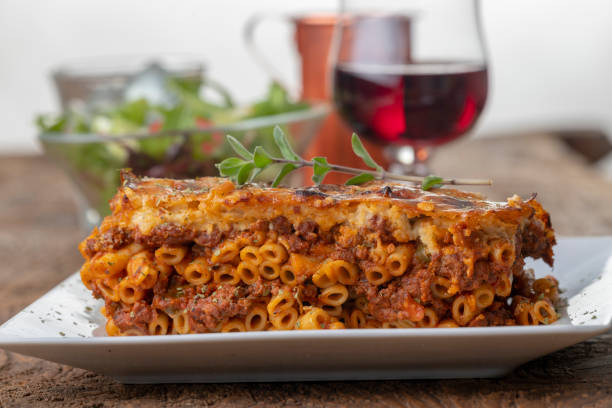 Traditional dish Pastitsio with wine